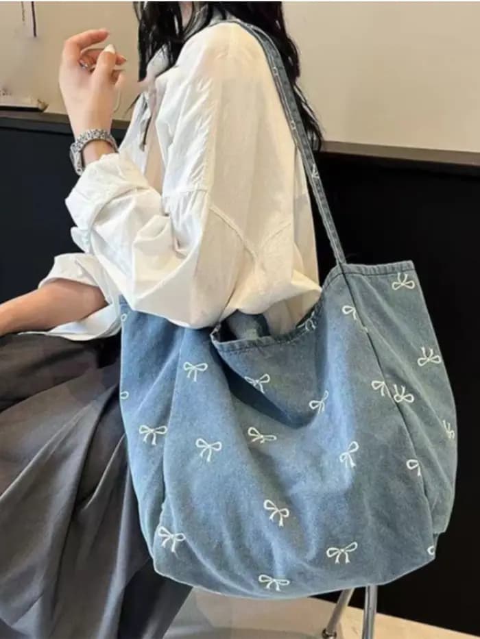 Sac à bandoulière en toile denim avec nœud