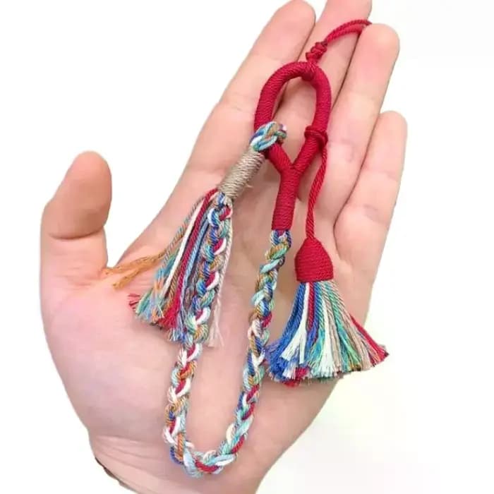 Lanière en coton tressé faite à la main avec des pompons colorés et de style bohème