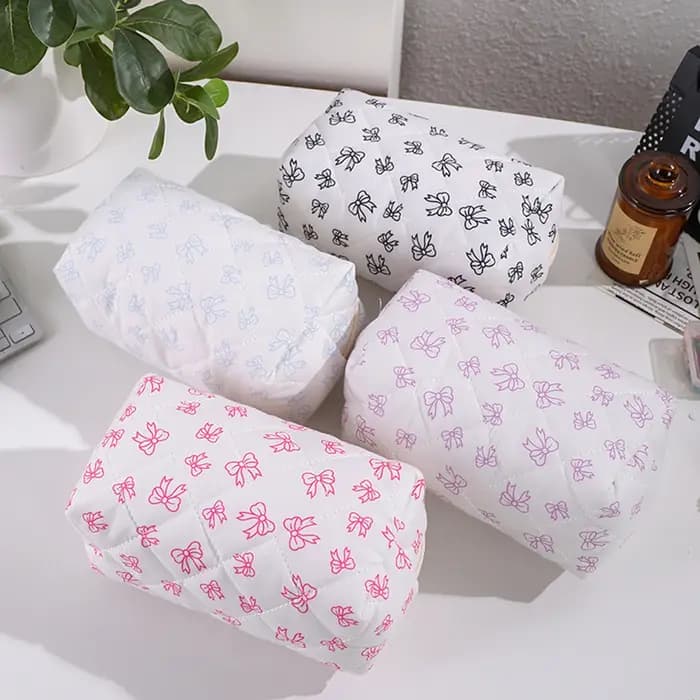 Magnifique trousse de maquillage à imprimé nœud papillon, design élégant, sac de rangement pour voyage en extérieur, trousse de toilette portable mignonne et grande capacité