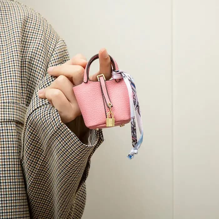 Nouveau Mini maison petit sac en cuir Portable main corde Bluetooth écouteur sac zéro portefeuille multi fonctionnel