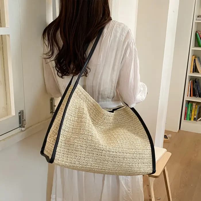 Sac fourre-tout en paille tressé avec garniture en cuir souple