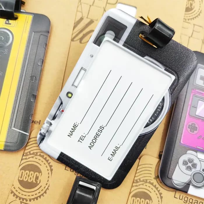 Étiquette de bagage pour appareil photo