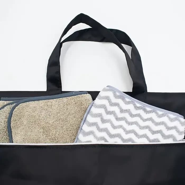 1 grand sac à linge de voyage avec poignée