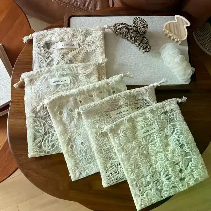 Sac en tissu prêt à l'emploi avec motif en dentelle brodée pour écouteurs