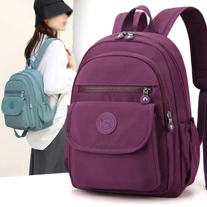 Sac à dos de voyage noir élégant léger et de grande capacité pour femme avec bretelles réglables