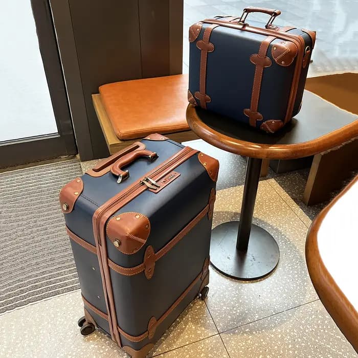 Valise de voyage vintage en cuir bleu pour affaires