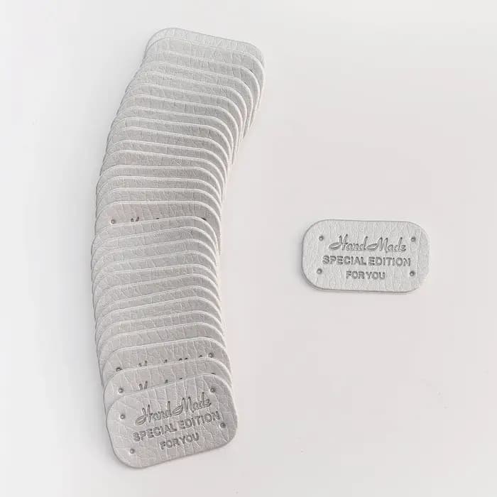 Étiquettes en cuir PU avec lettres faites à la main