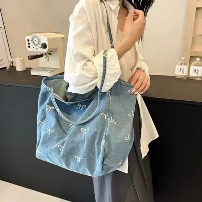 Sac à bandoulière en toile denim avec nœud
