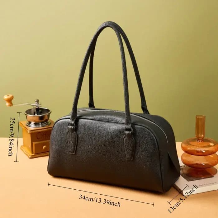 Sac bowling East-West pour femme en cuir véritable vintage