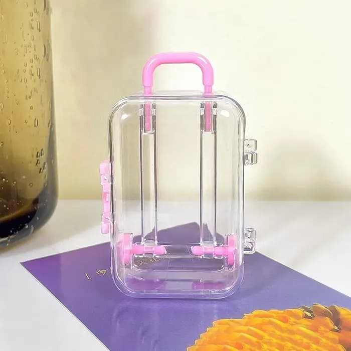 Mini valise à ornement lumineux avec roues rétractables