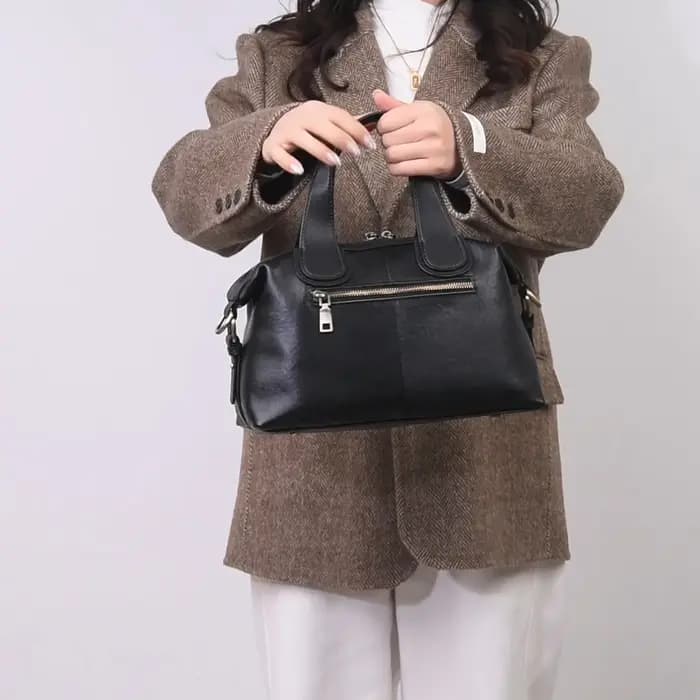 Sac Boston noir minimaliste en cuir véritable pour femmes