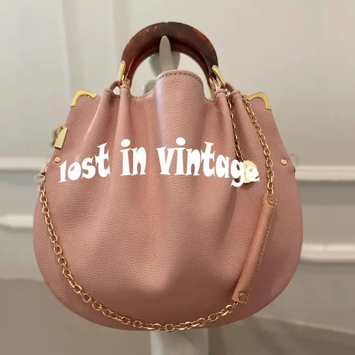 Perdu dans les détails vintage et le sac en cuir artificiel à bandoulière fendue avec doubles poigné