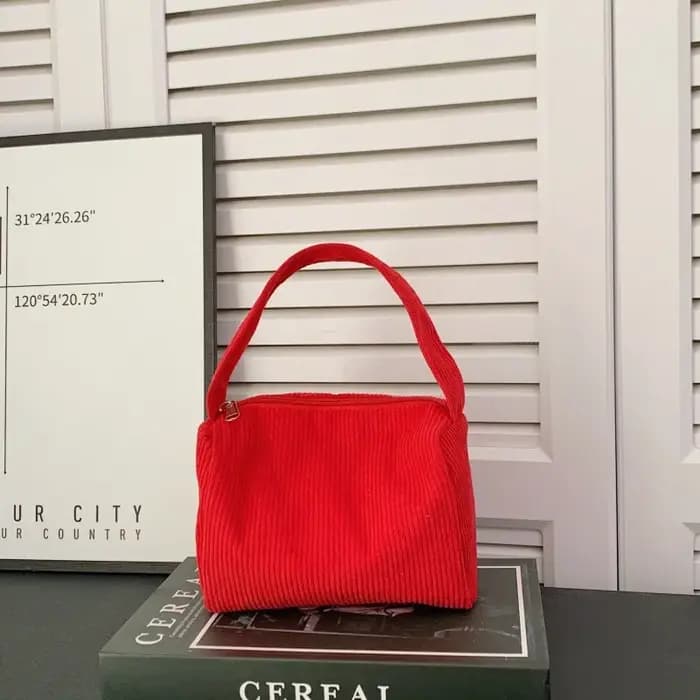Sac carré compact à porter à la main