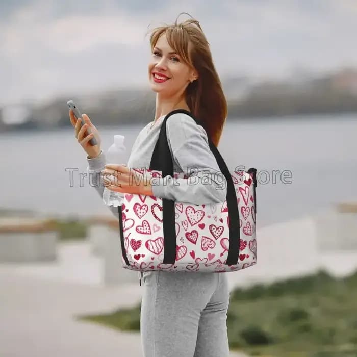 Sac polochon de voyage à motif coeurs d'amour pour femmes