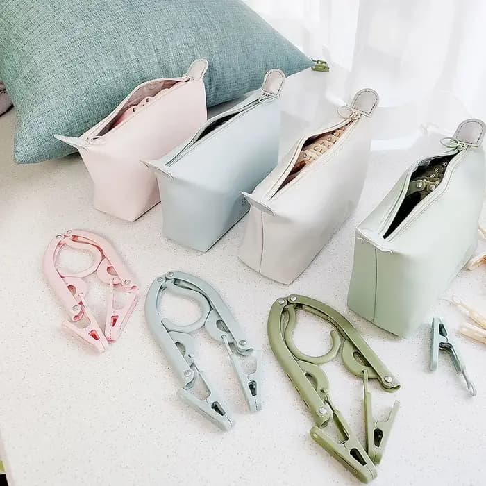 Cintre de voyage pliable dans un sac de rangement : un indispensable portable pour les hôtels