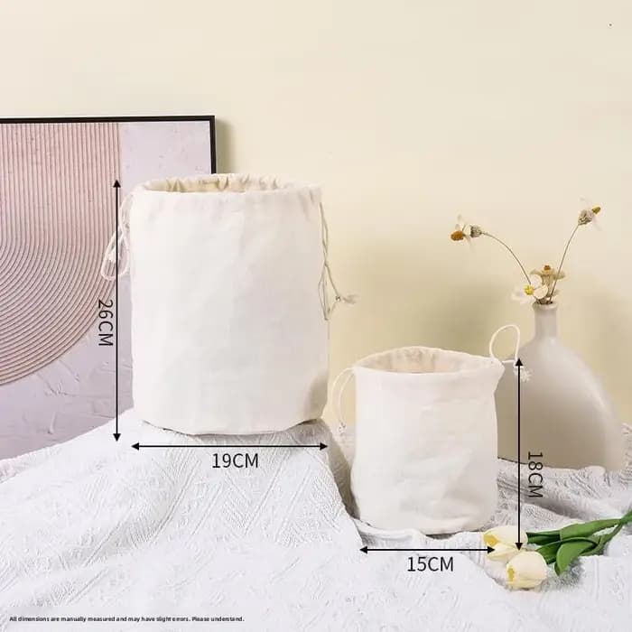 Sac en toile à fond rond avec cordon de serrage
