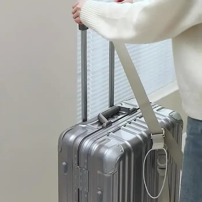Attache réglable pour bagages