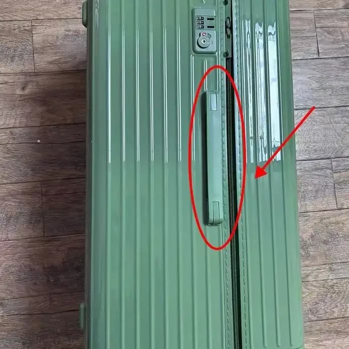 Poignées de valise remplacées pour Rimowa