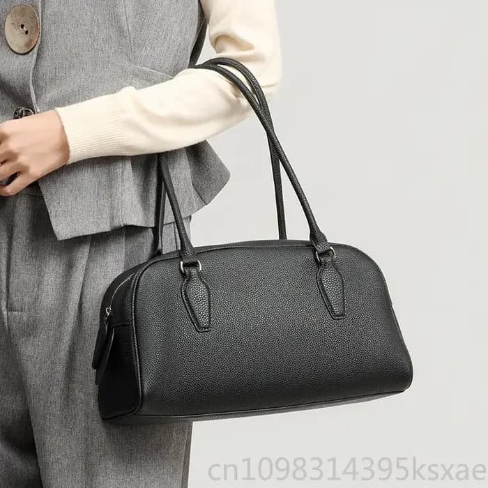 Sac bowling East-West pour femme en cuir véritable vintage