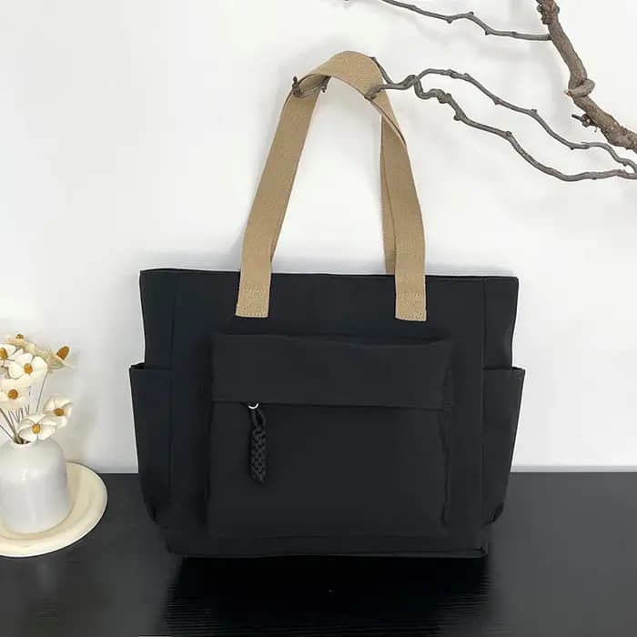 Sac fourre-tout en nylon avec plusieurs poches, design léger et pliable pour les déplacements au bur