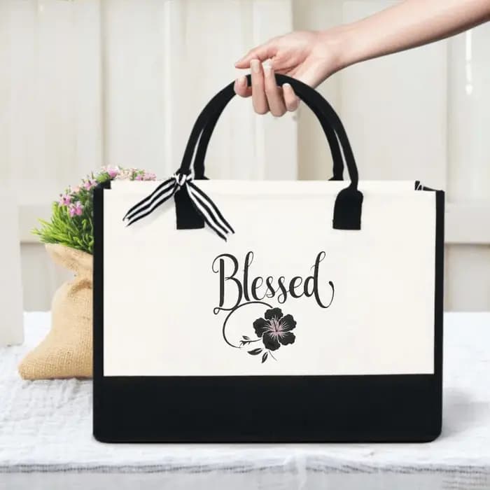 Sac fourre-tout en toile au design floral blanc et noir pour un usage quotidien, un shopping et un t
