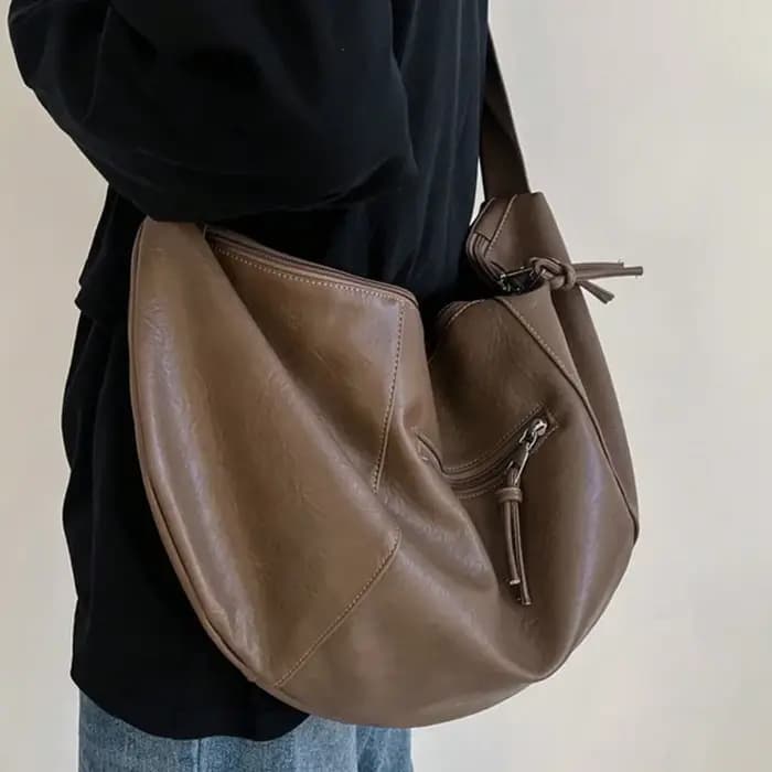 Sac à bandoulière élégant en PU en forme de boulette pour hommes, adapté aux sorties décontractées e