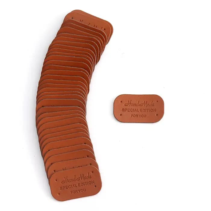 Étiquettes en cuir PU avec lettres faites à la main