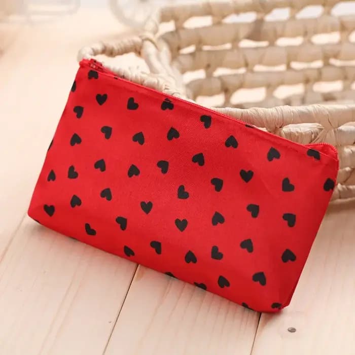 Trousse de maquillage à fermeture éclair motif cœur pour femme