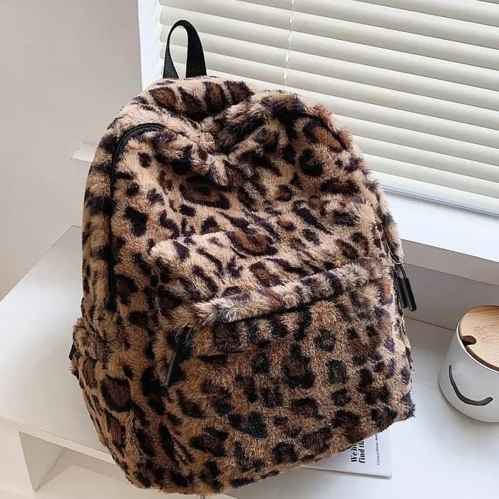 Sac à dos de luxe imprimé léopard pour femmes