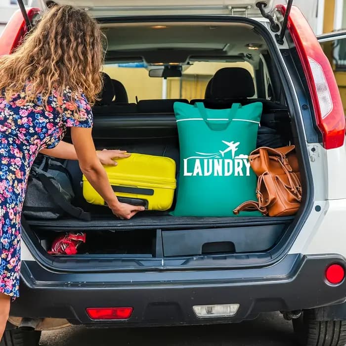 1 grand sac à linge de voyage avec poignée