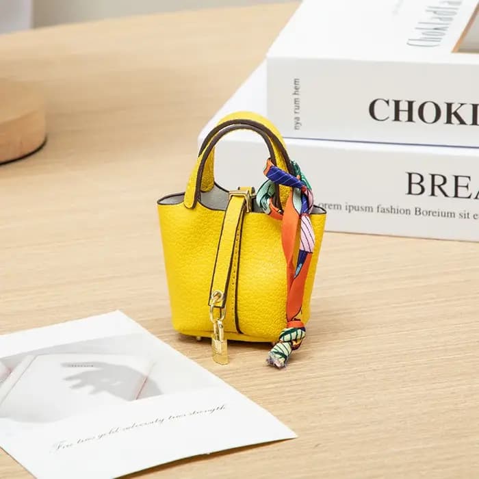 Nouveau Mini maison petit sac en cuir Portable main corde Bluetooth écouteur sac zéro portefeuille multi fonctionnel