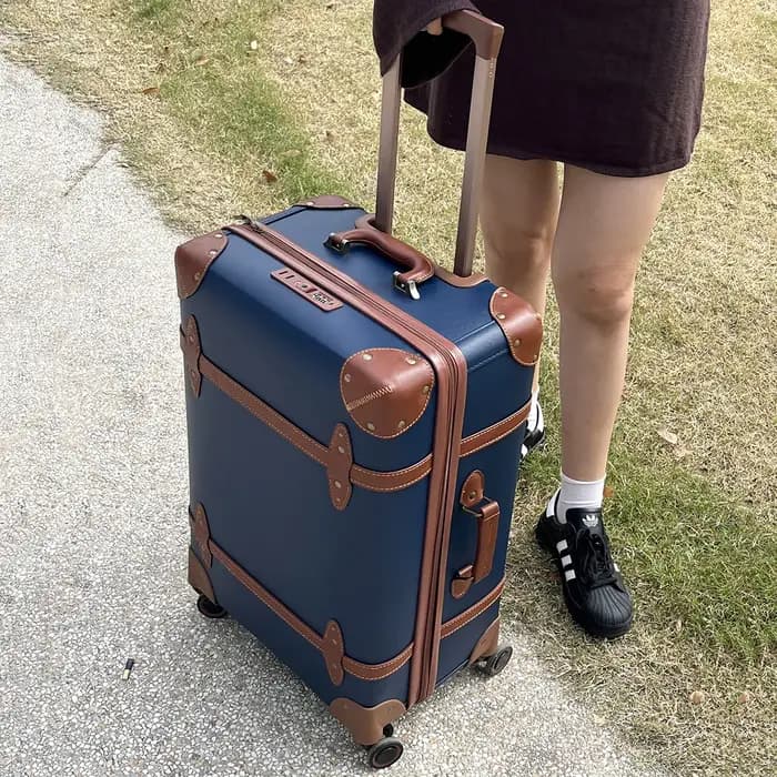Valise de voyage vintage en cuir bleu pour affaires