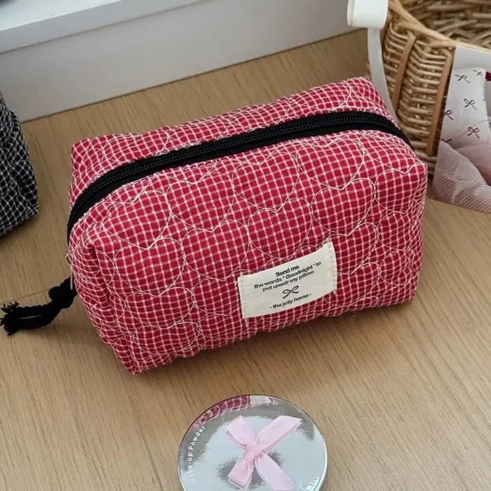 Sac de maquillage classique matelassé en forme de cœur