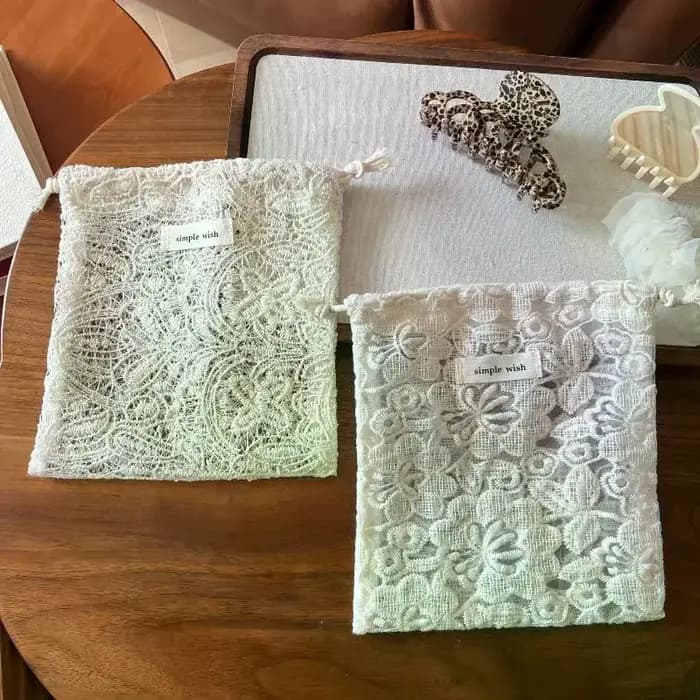 Sac en tissu prêt à l'emploi avec motif en dentelle brodée pour écouteurs