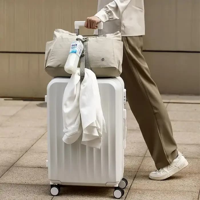 Attache réglable pour bagages