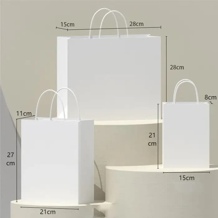 Sacs en papier Kraft blanc avec poignées