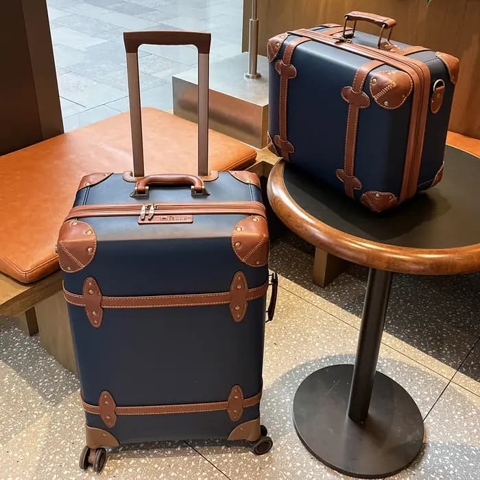 Valise de voyage vintage en cuir bleu pour affaires