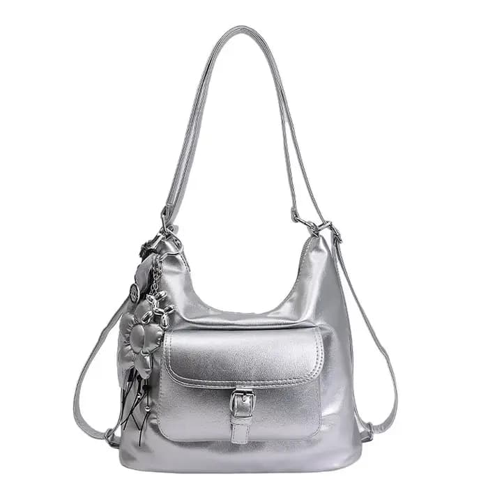 Sac à dos de voyage argenté pour femme, grande capacité, sac à bandoulière pour trajets quotidiens, nouveau style 2026, sac seau en PU résistant au vent pour l'extérieur