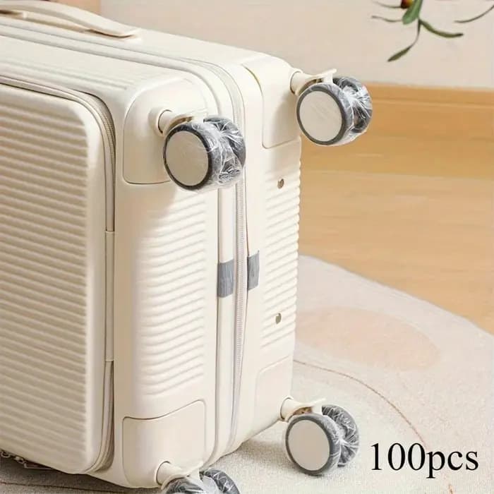Housse de protection jetable pour roue de bagage