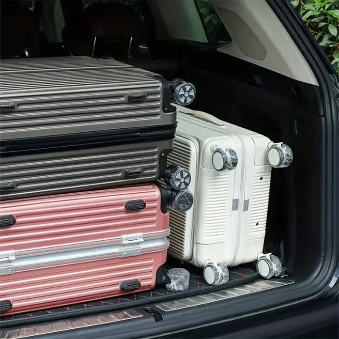 Housse de protection jetable pour roue de bagage