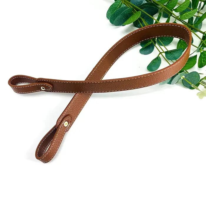 Accessoire de bandoulière pour sac à dos