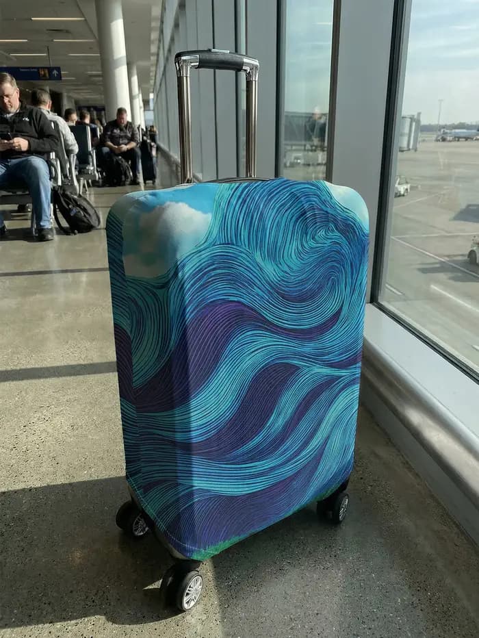 Housse de protection pour bagages à ligne ondulée bleue et violette