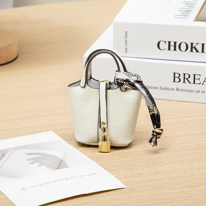 Nouveau Mini maison petit sac en cuir Portable main corde Bluetooth écouteur sac zéro portefeuille m