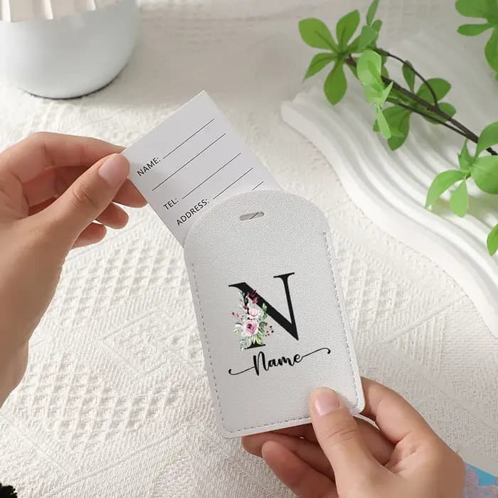Étiquette de bagage personnalisée avec nom sur unité centrale robuste et élégante pour valise de voyage en 26 couleurs disponibles