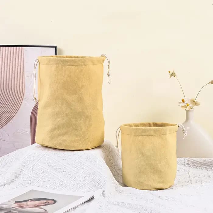 Sac en toile à fond rond avec cordon de serrage