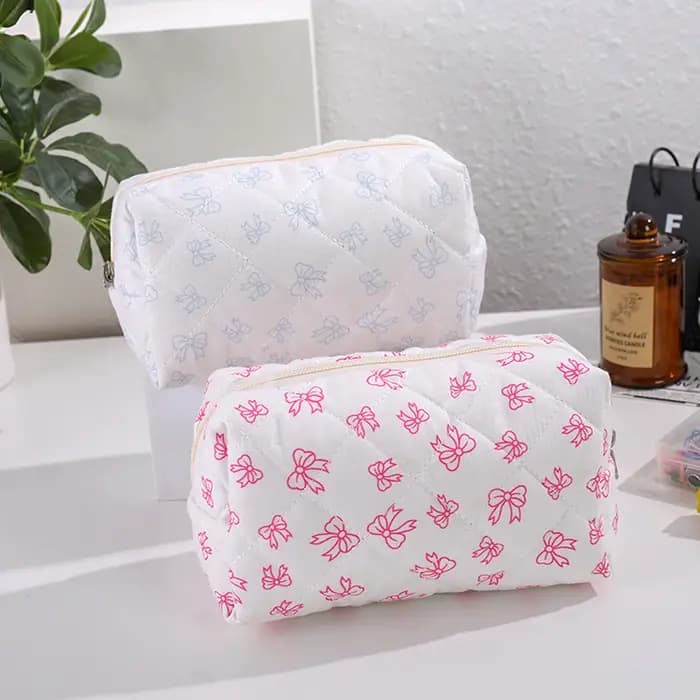 Magnifique trousse de maquillage à imprimé nœud papillon, design élégant, sac de rangement pour voyage en extérieur, trousse de toilette portable mignonne et grande capacité