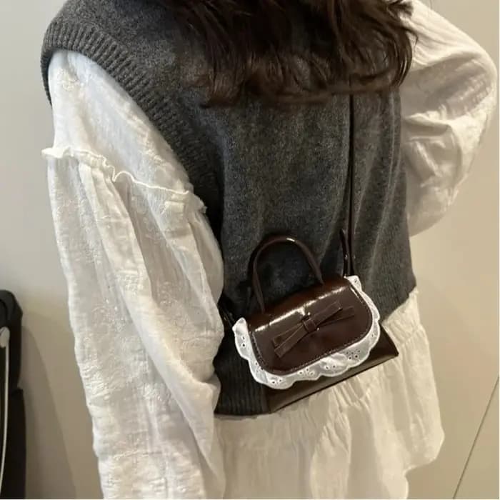 Sac bandoulière mini tendance en cuir PU avec nœud en dentelle