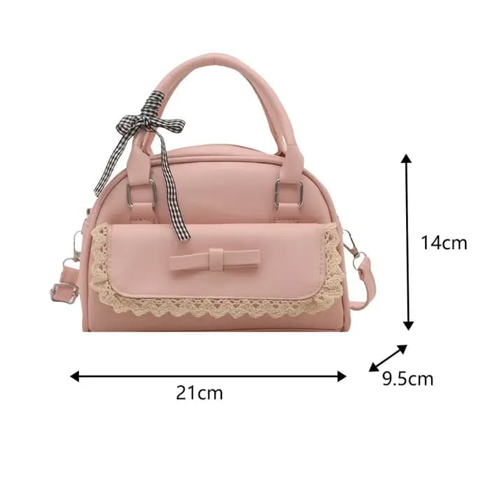 Un sac Boston polyvalent à main avec nœud papillon pour femmes en version coréenne 2025