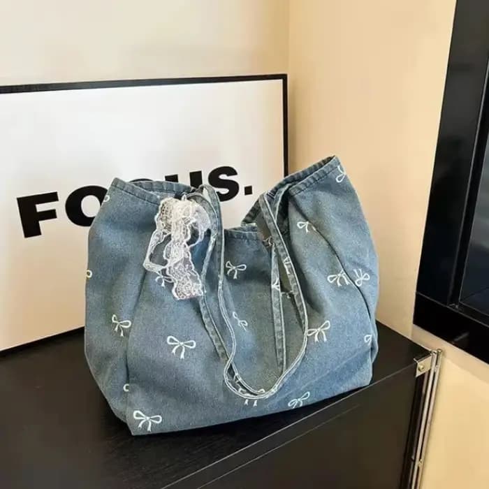 Sac à bandoulière en toile denim avec nœud