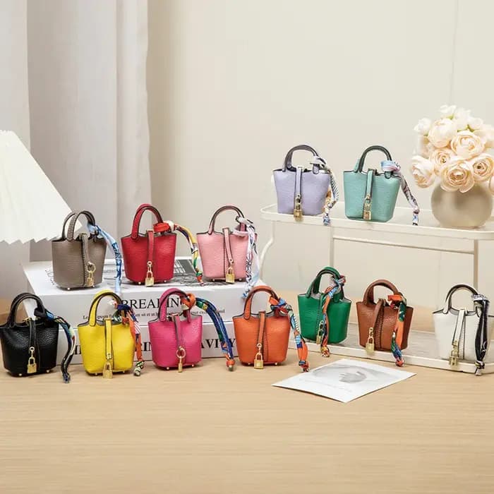 Nouveau Mini maison petit sac en cuir Portable main corde Bluetooth écouteur sac zéro portefeuille multi fonctionnel